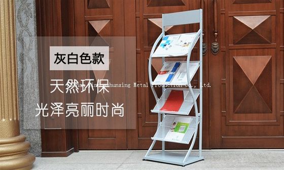 La rivista del metallo delle gomme di H1500mm L480mm quattro, giornali visualizza lo scaffale  Per il deposito di libro, annuncio